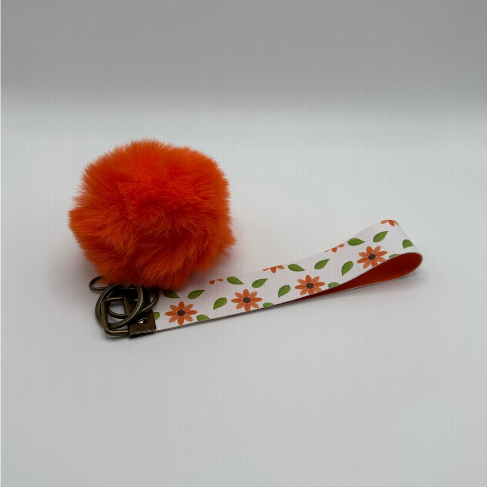 Orange Pom Pom Keychain with Floral Wristlet